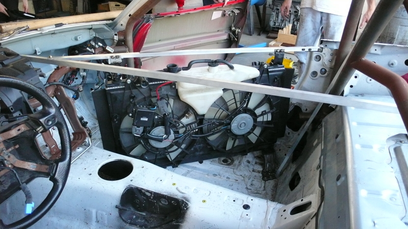 Illustration for article titled Eyesore Racing's Ghettocharged Miata Fears No Turbocharged Peugeot Surrender Monkeys!